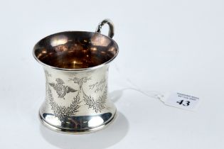 A SCARCE ROYAL FLYING CORPS SILVER MUG with engraved insignia within a garland of flowers,