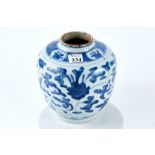 A CHINESE MING DYNASTY PORCELAIN OVOID VASE decorated in underglaze blue with meandering foliage,