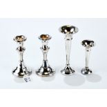 A PAIR OF GEORGE V SILVER CANDLESTICKS raised on circular bases, maker: S.P.