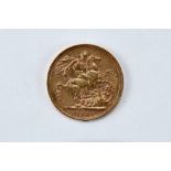 AN 1889 GOLD SOVEREIGN, crowned head, approx 8 grams.