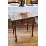 A GEORGIAN REVIVAL OAK LOWBOY, the cusp corner top above three small drawers,