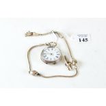 A VICTORIAN CONTINENTAL WHITE METAL KEYWIND OPEN FACE FOB WATCH,