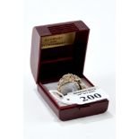 A 9CT GOLD MULTI-DIAMOND SET RING with diamond shoulders, size Q, approx 3.9 grams.