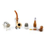 A NOVELTY BOTTLE FORM SECTIONAL SMOKING PIPE with stanhope viewer, 5 1/2" long,