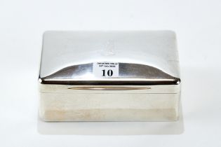 A VICTORIAN RECTANGULAR SILVER CIGARETTE BOX, engraved crest to lid, maker: WG.