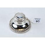 A GEORGE V CIRCULAR SILVER CAPSTAN INKWELL, hinged lid and beaded borders, maker: WJM & Co,