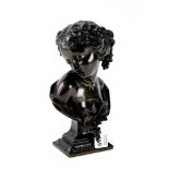 A 19th CENTURY BRONZE CLASSICAL BUST OF A YOUNG MAIDEN with grape and vine leaf adorned hair on a