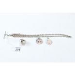 AN EDWARDIAN WHITE METAL GRADUATED WATCH CHAIN, marks rubbed, 18" long,