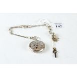 A VICTORIAN KEYWIND OPEN-FACE WHITE METAL POCKET WATCH with engraved silver/gold coloured dial,
