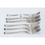 A SET OF SIX GEORGE III SILVER TABLE FORKS, engraved winged crest, maker: SP, London 1817,