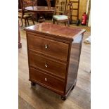 A 19th CENTURY CONTINENTAL MAHOGANY CHEST OF DRAWERS, three drawers raised on turned front feet,