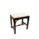 AN EDWARDIAN MAHOGANY CHIPPENDALE REVIVAL DRESSING STOOL,