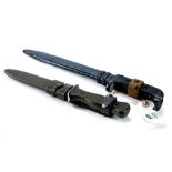 A 20th CENTURY BAYONET-KNIFE black grips, 8" blade with black steel scabbard, and a MILITARY DAGGER,