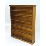 An oak shelving unit / bookcase. Approx. 65" high x 54" wide x 10" deep Please Note - we do not make