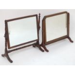 A late 19thC mahogany toilet mirror with a rectangular frame and ring turned supports, together with