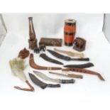 A quantity of assorted tribal items to include fly swish, drum, figures, knives etc. Please Note -