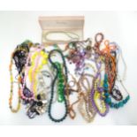 A quantity of assorted costume jewellery to include bead necklaces Please Note - we do not make