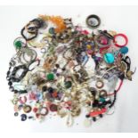A large quantity of costume jewellery to include bracelets, earrings, necklaces, etc. Please