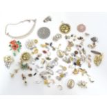 A quantity of assorted costume jewellery, to include brooch, earrings, etc. to include a silver