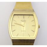A gentleman's Rotary wristwatch with quartz movement, gold plated stainless steel. Dial approx. 1"
