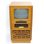 A boxed Steepletone model NTV010 vintage retro style television. Approx 35" high Please Note - we do