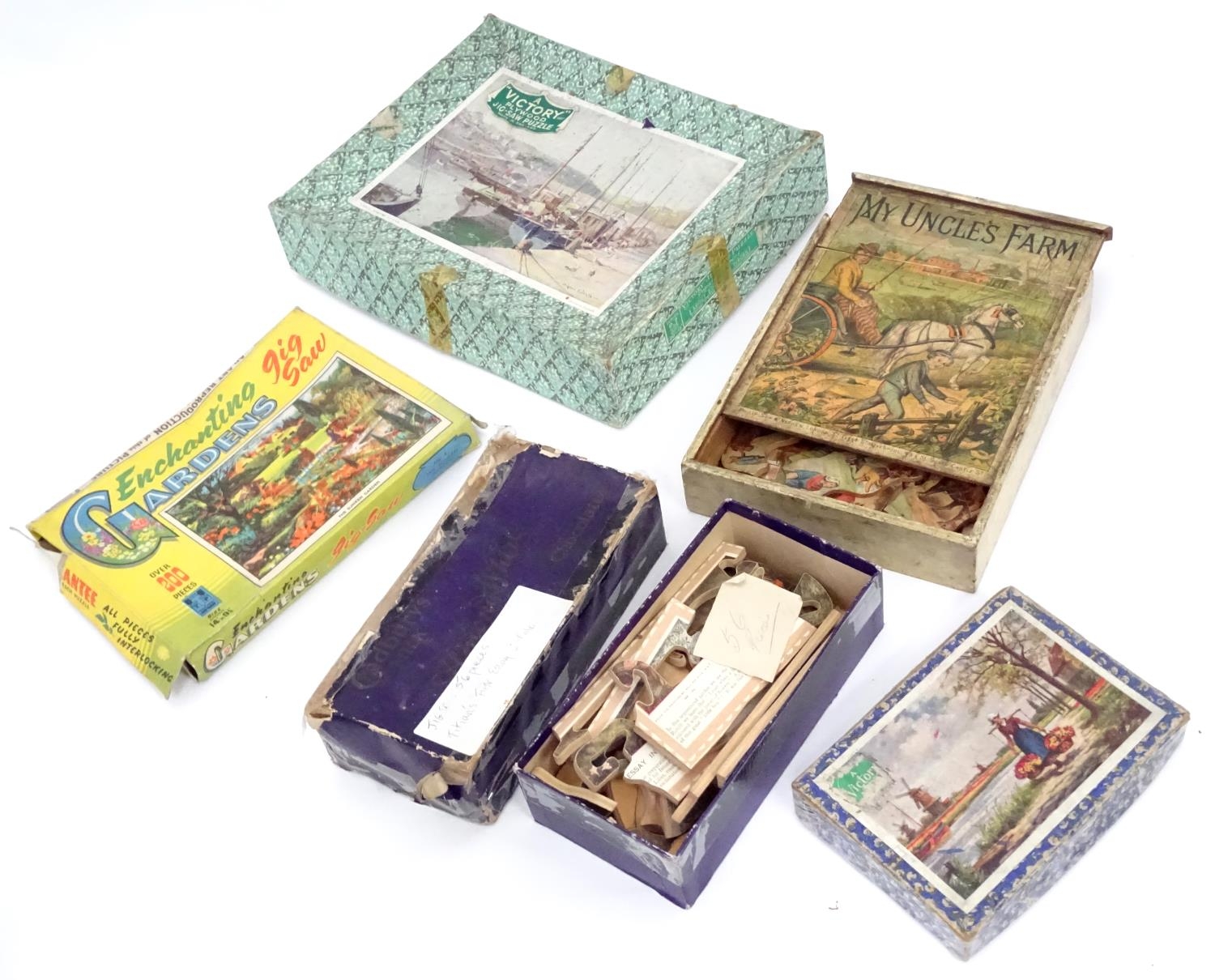 An assortment of early 20thC children's games, puzzles etc. Please Note - we do not make reference