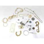A quantity of assorted costume jewellery to include necklaces, pendants, etc. Please Note - we do