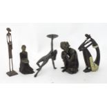 Four assorted cast figures to include an abstract model of an African lady, Karimu Generous One by