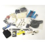 A quantity of assorted equestrian equipment to include a numnah, waterproof saddle cover, girths,
