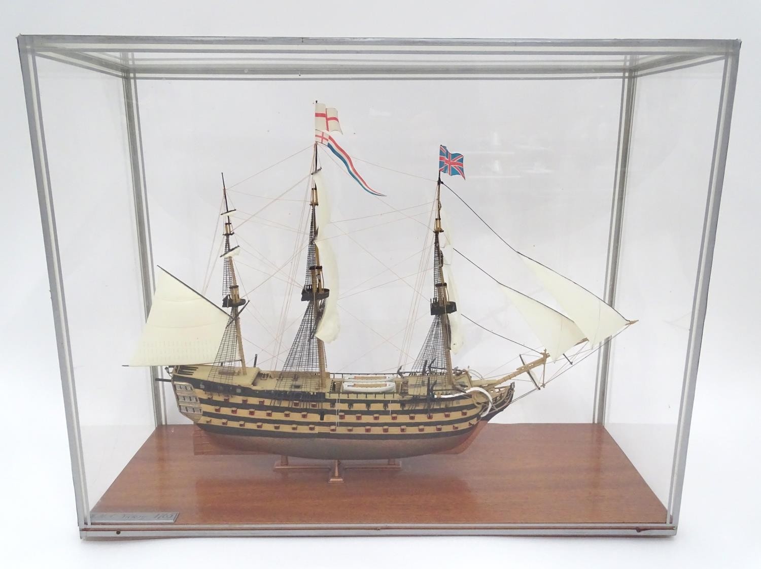 A model of HMS Victory in a perspex case Please Note - we do not make reference to the condition
