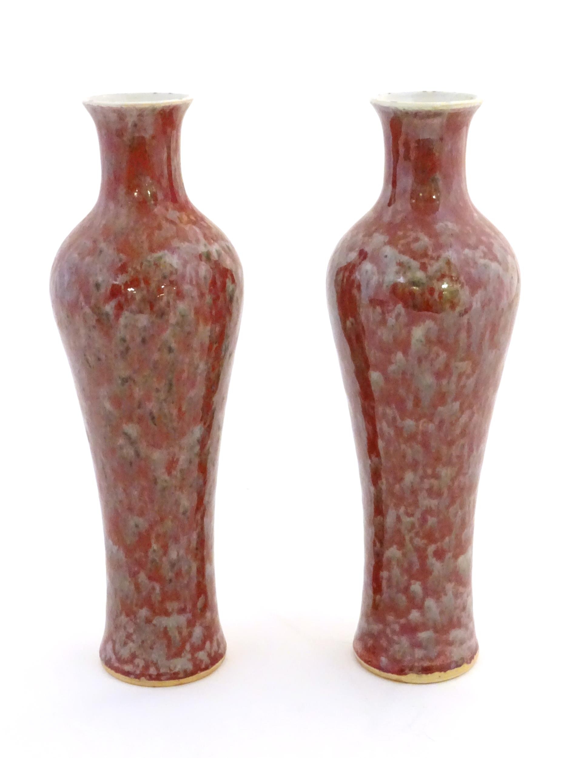 A pair of Chinese vases of elongated form decorated with a mottled glaze. Double ring mark under. - Image 3 of 8