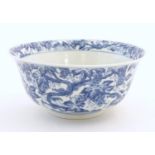 A Chinese blue and white bowl decorated with vine leaves and grapes. Character marks under.