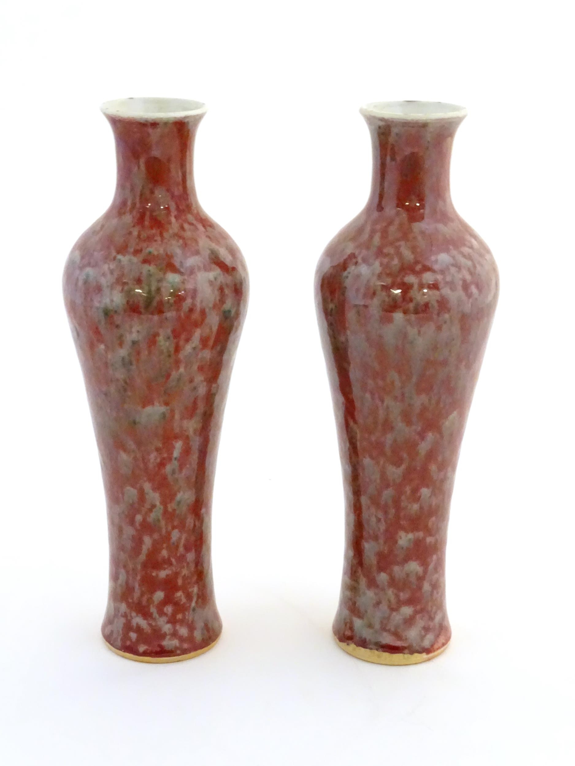 A pair of Chinese vases of elongated form decorated with a mottled glaze. Double ring mark under. - Image 5 of 8