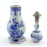 A Continental scent bottle of double gourd form with blue and white foliate decoration with Dutch