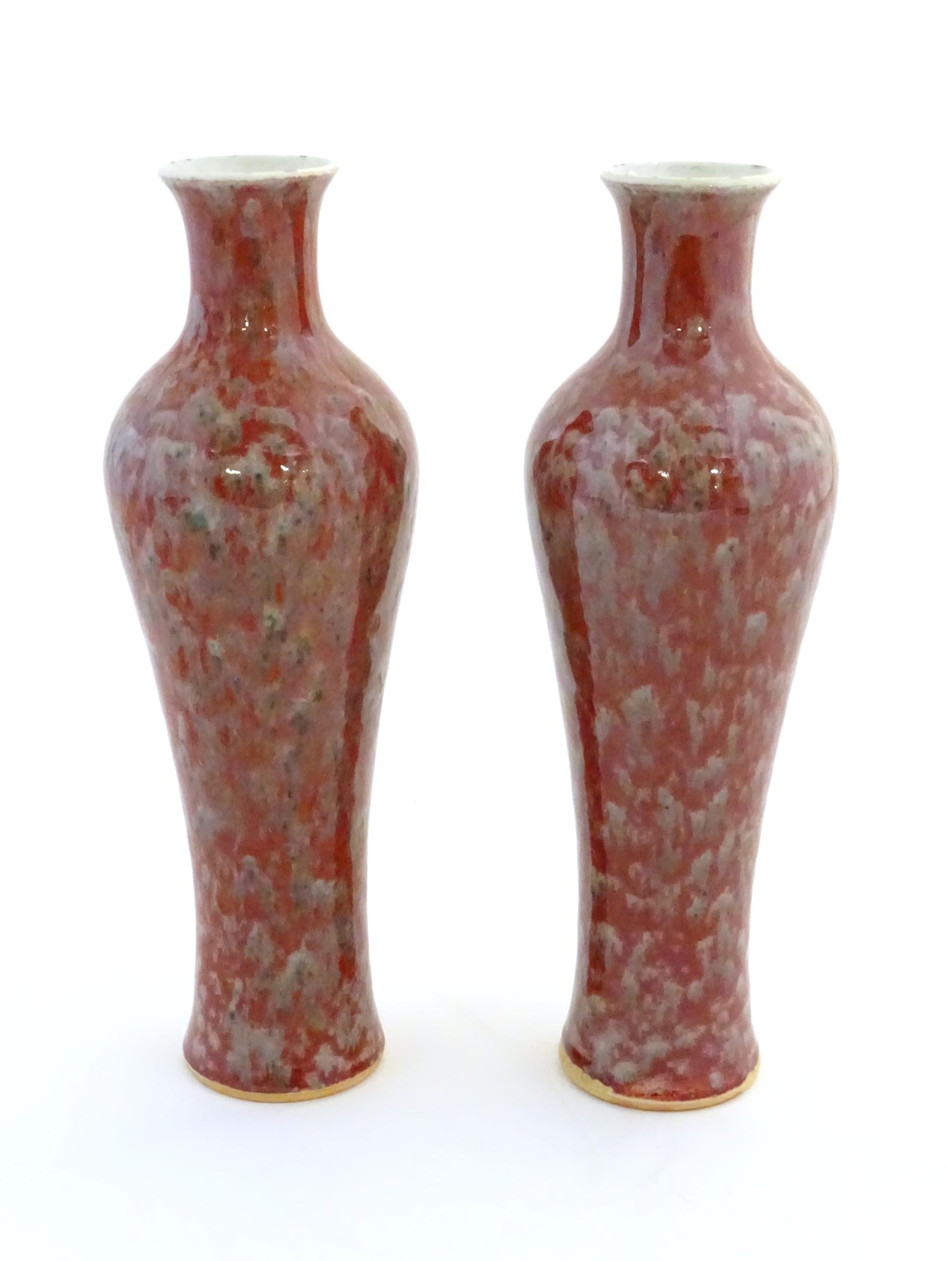 A pair of Chinese vases of elongated form decorated with a mottled glaze. Double ring mark under. - Image 4 of 8