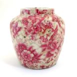 A Continental squat vase with a pink flower and foliate detail and a crackle glaze. Approx. 5 3/4"