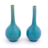 Two Oriental bottle vases with a turquoise ground. Largest approx. 9 1/2" high (2) Please Note -