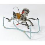 Toy: A 20thC child's rocker / dapple grey rocking horse on a sprung tubular frame. Approx. 23"