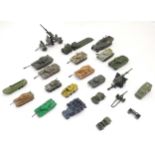 Toys: A quantity of assorted die cast scale model military vehicles to include Dinky Toys: 7.5cm
