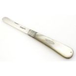 A silver folding fruit knife with mother of pearl handle, hallmarked Sheffield 1908, maker William