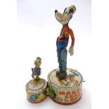 Toy: A 20thC tin plate clockwork toy, titled Marx Crazy Dancer, depicting Walt Disney's Goofy