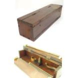 Shooting: a 20thC shotgun cleaning kit, the mahogany case with hinged lid and front section, 19 3/4"