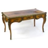 A C.1910 Louis XV style rosewood veneered bureau plat by Danish maker 'Lysberg and Hansen'. Having a