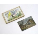 A 19thC oil on tin miniature depicting a village street scene with a hunting gentleman on