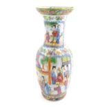 A large Chinese / Cantonese famille rose baluster vase with a flared rim decorated with panels