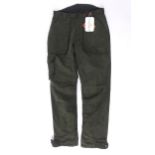 Sporting / Country pursuits: A pair of Laksen Kodiak hunting trousers in olive green, new with tags,