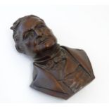 A 20thC Continental carved wooden portrait bust of Adolphe Thiers, former President of France.