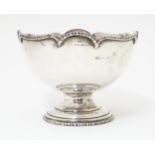 A silver pedestal bowl. Marked Sterling Silver. with indistinct maker mark. Approx. 4 1/2"