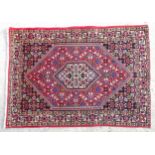 Carpet / Rug : A Bidjar rug with red, cream and blue ground with floral, foliate and geometric