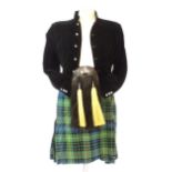 Vintage fashion / clothing: A Scottish kilt, sporran and Sherrifmuir velvet style jacket in black